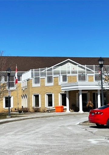 Commercial housing with cars parked out front